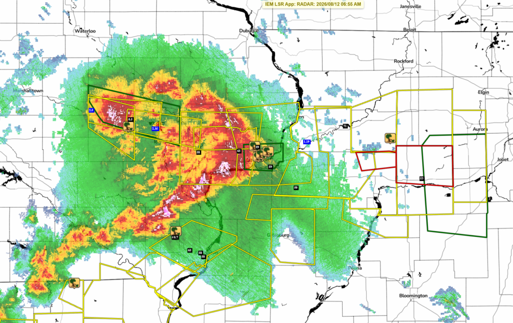 Wednesday Morning Severe Weather - IowaWeather.com Radar weather map showing a large storm system west of central Illinois with red/orange core and green outer rain, covered by multiple yellow warning polygons.